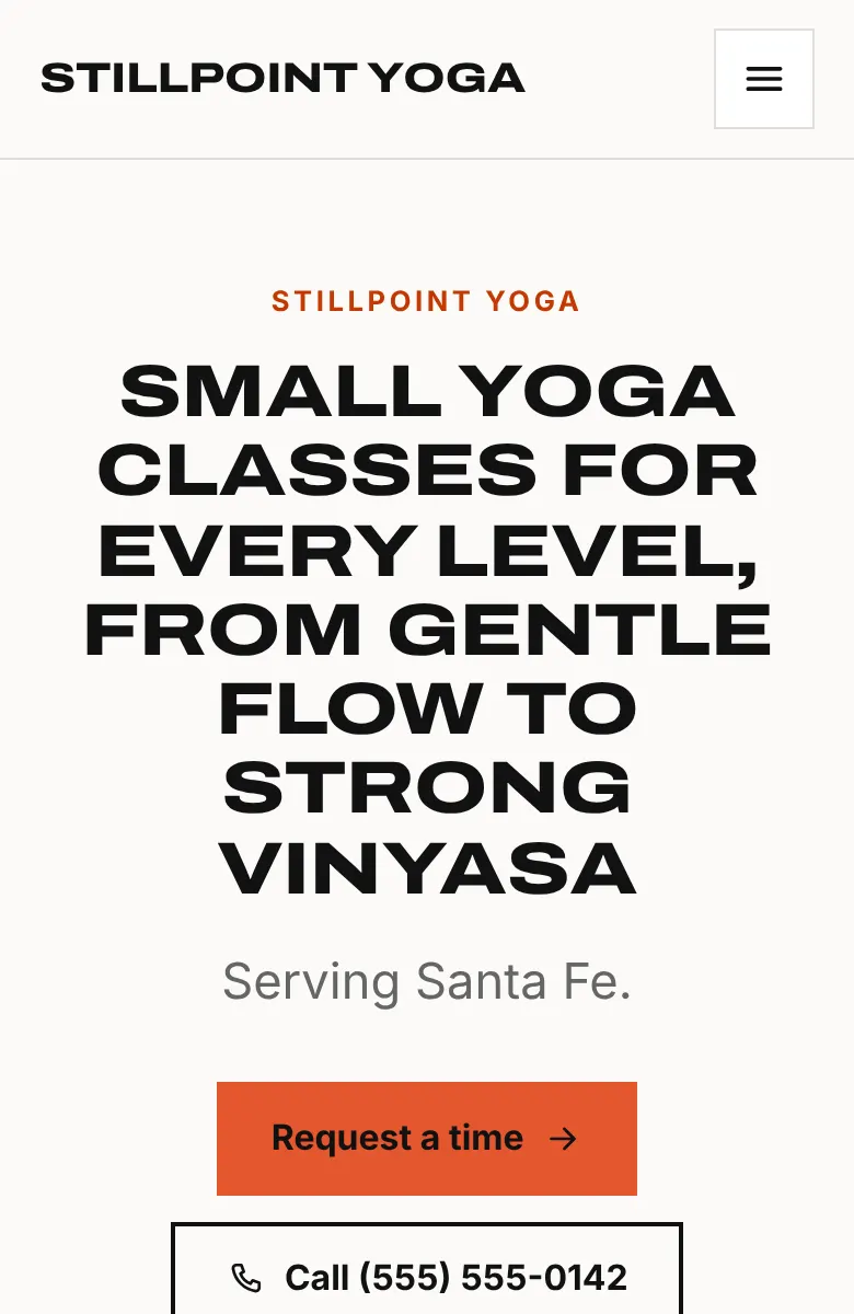 Sample yoga studio website on a phone