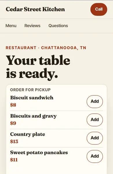 Sample restaurant website on a phone